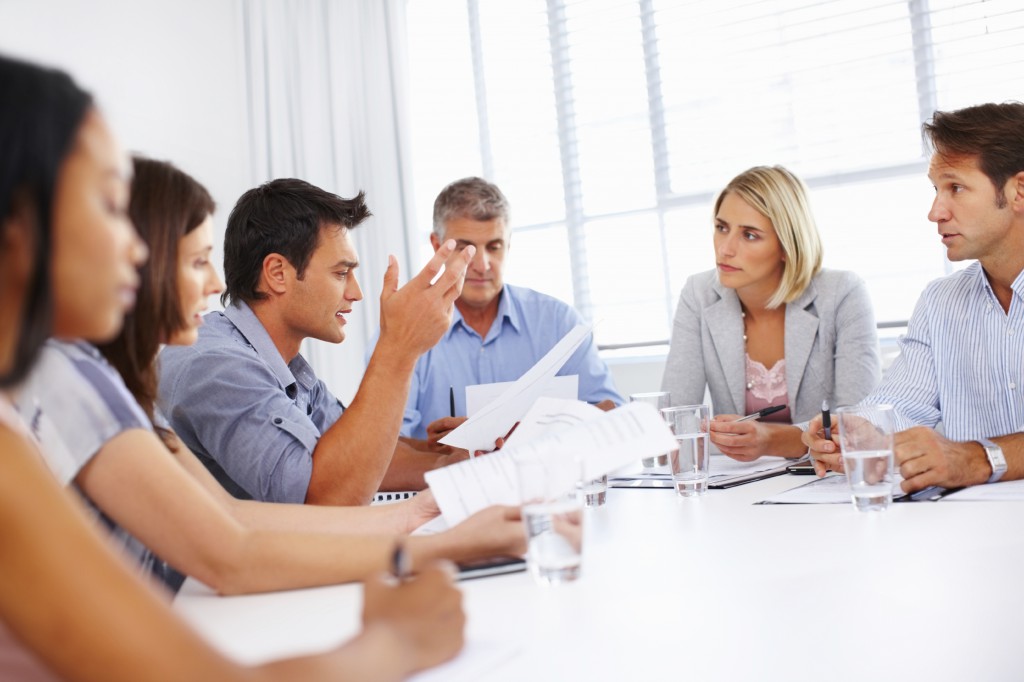 Business man discussing a point during meeting